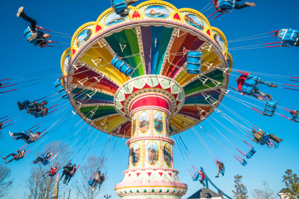 Riders swinging around the Flying Carousel